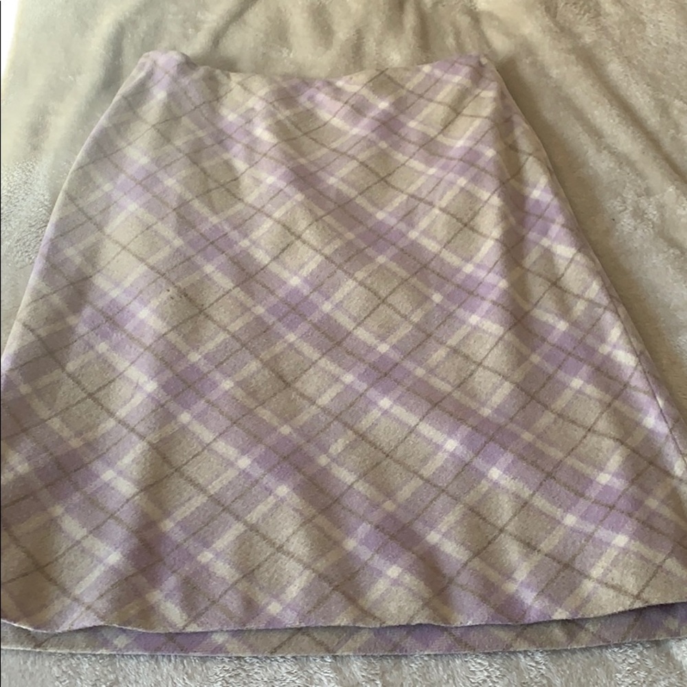 Ann Taylor size 4 over the kneel wool skirt.